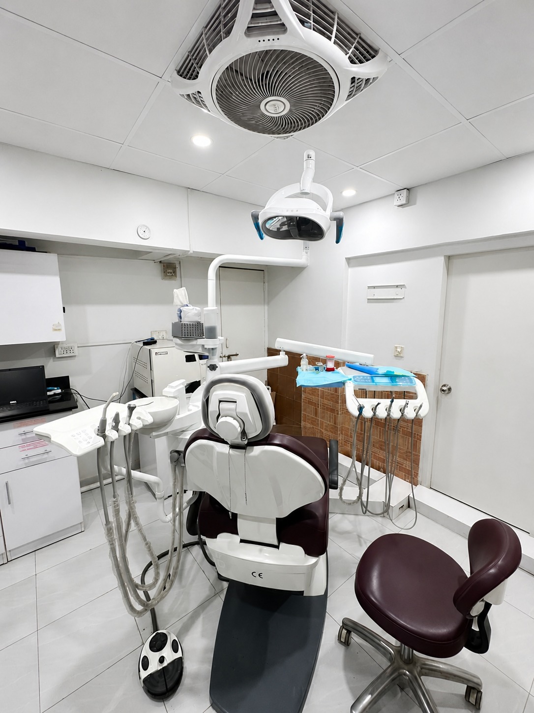 Interior of The Best Dentist clinic treatment room with modern equipment